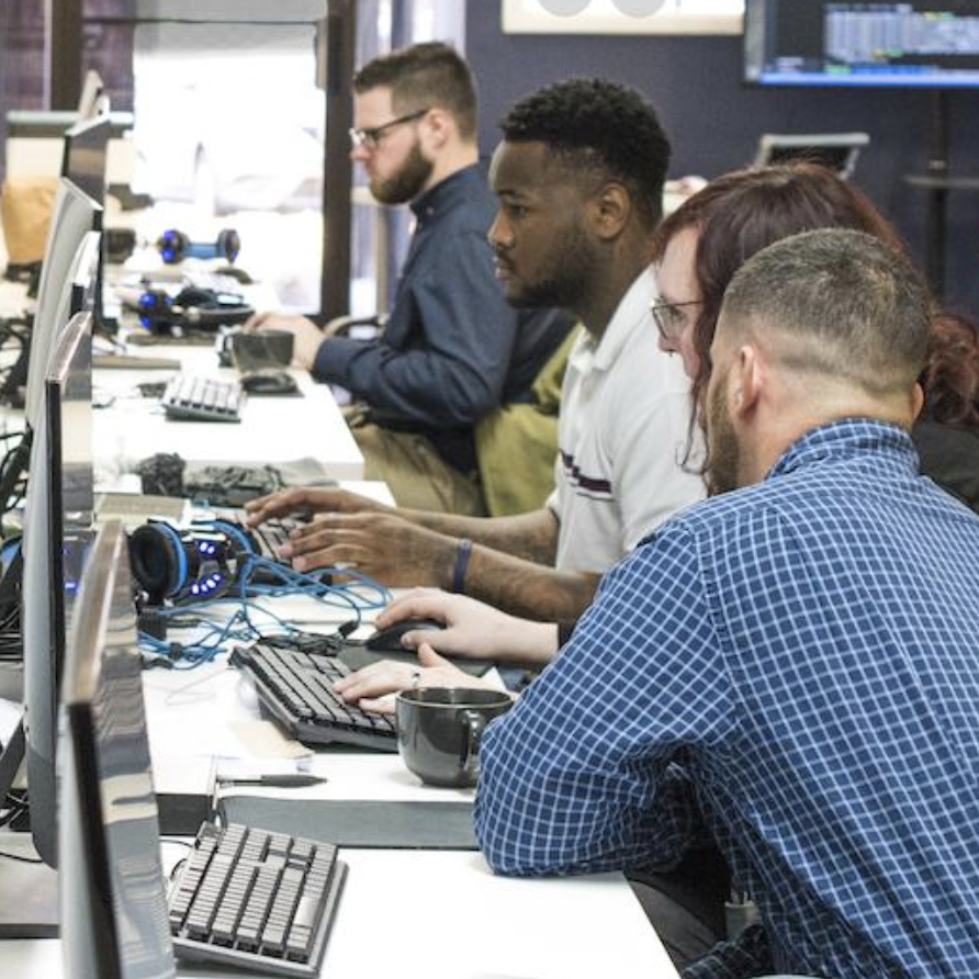 Inmates participating in the Persevere coding program.
