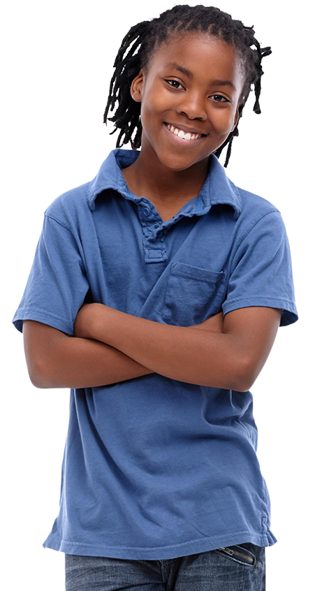 Happy African American boy standing with arms folded